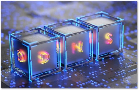 glowing letters D N and S in glass-looking blocks